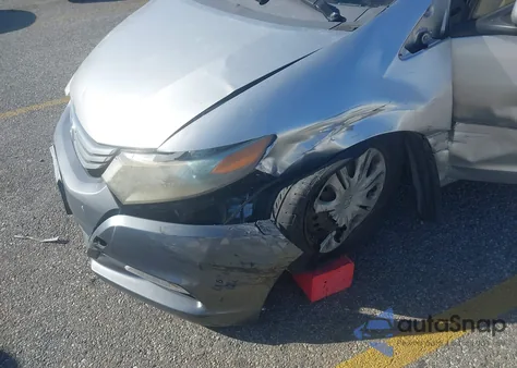 2010 Honda Insight Lx from USA, damaged, VIN JHMZE2H57AS008296